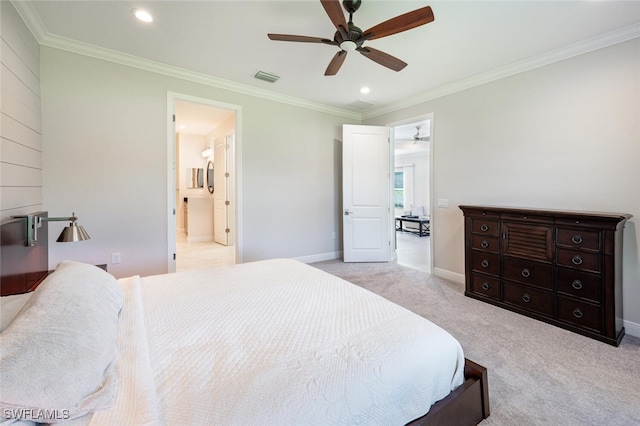 bedroom with ceiling fan, crown molding, ensuite bathroom, and light carpet