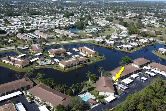 drone / aerial view with a water view