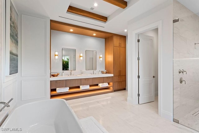 bathroom featuring vanity, beam ceiling, and plus walk in shower