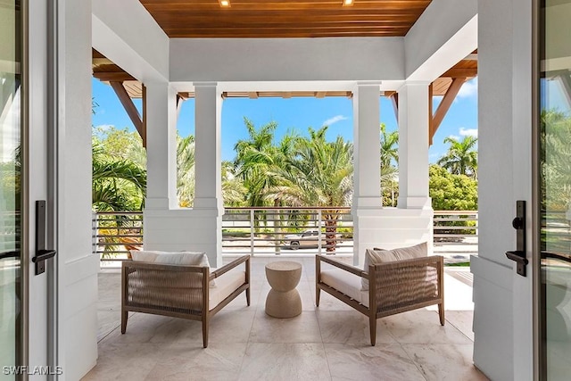 exterior space featuring french doors and wooden ceiling