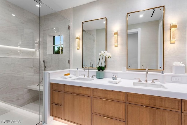 bathroom with vanity and an enclosed shower