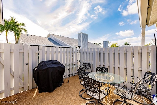 view of patio with a grill