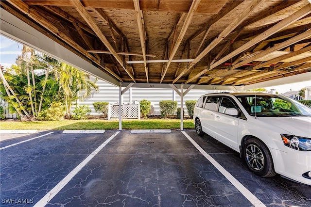 view of parking featuring a carport