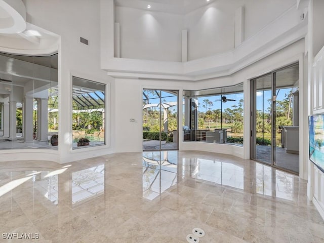 unfurnished sunroom with visible vents