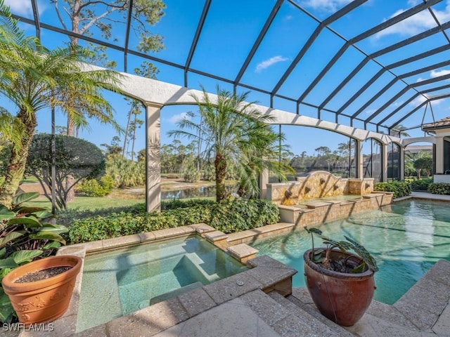 pool with glass enclosure and an in ground hot tub