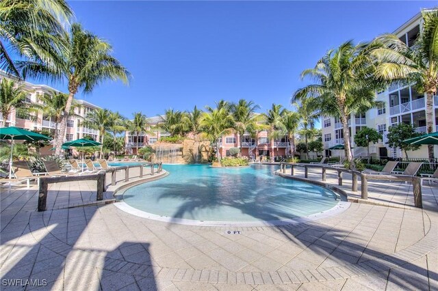 view of swimming pool featuring a patio area