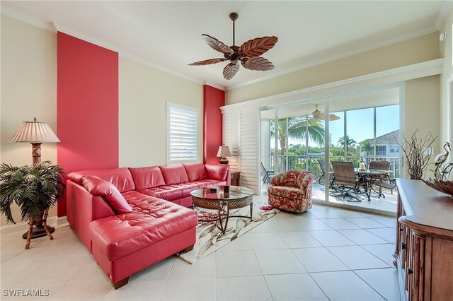 tiled living room featuring ceiling fan and ornamental molding