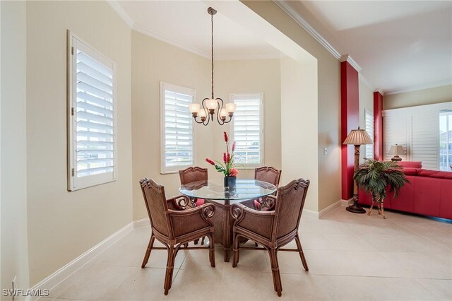 dining area featuring a notable chandelier, ornamental molding, light tile patterned flooring, and baseboards