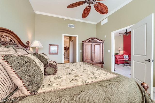 carpeted bedroom with ceiling fan, ensuite bath, visible vents, and crown molding