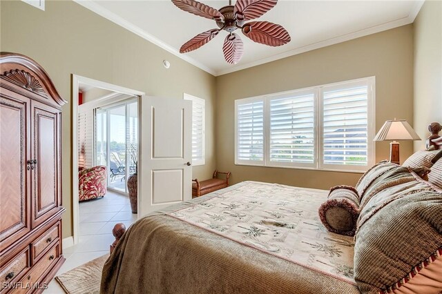 bedroom featuring ceiling fan, access to exterior, light tile patterned floors, and multiple windows