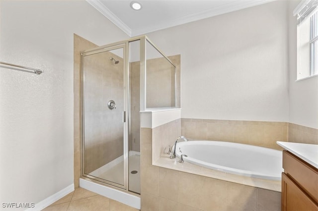 bathroom featuring tile patterned flooring, vanity, crown molding, and shower with separate bathtub