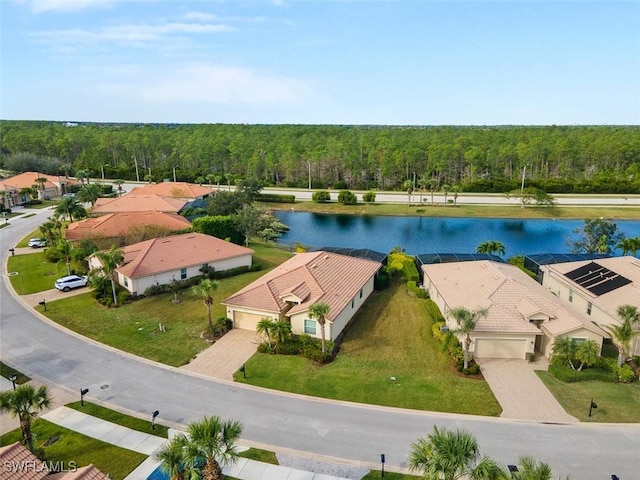 drone / aerial view with a water view