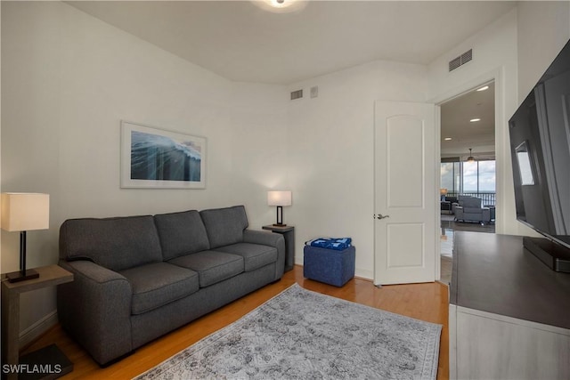 living room with hardwood / wood-style floors