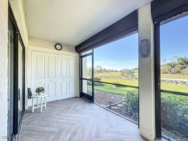 view of unfurnished sunroom