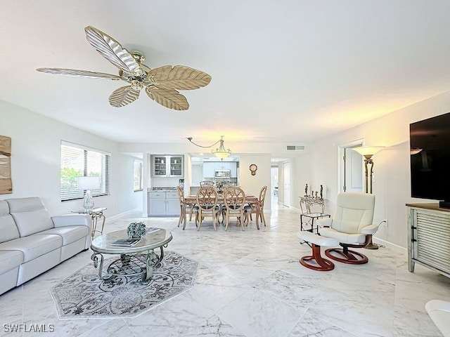 living room featuring ceiling fan