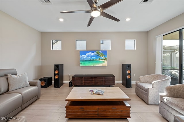 living area featuring a ceiling fan, recessed lighting, visible vents, and baseboards