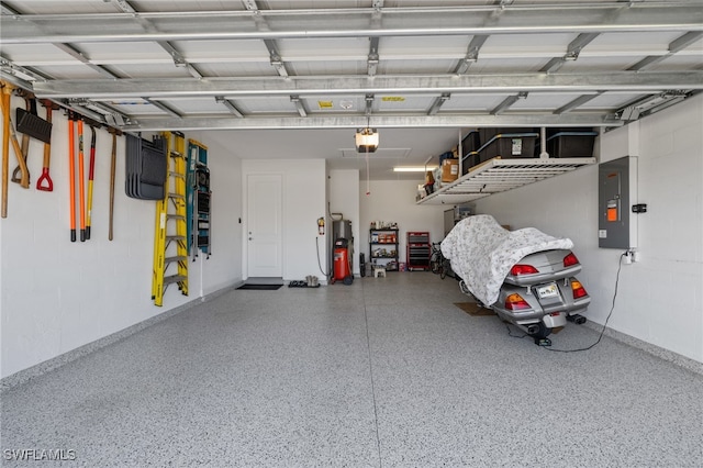 garage with electric water heater, electric panel, and a garage door opener