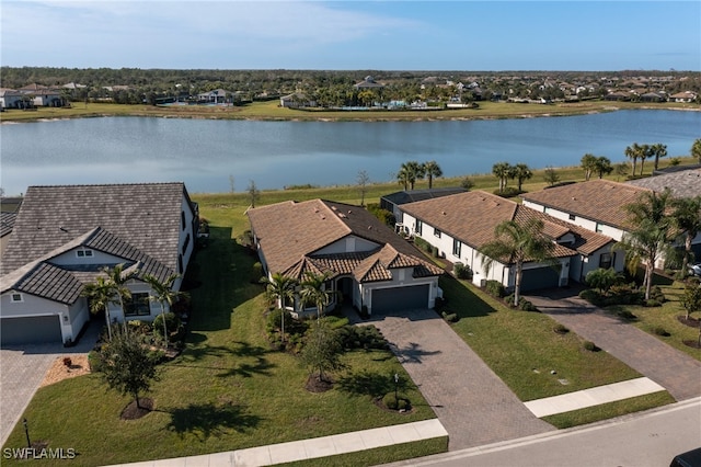 drone / aerial view with a water view