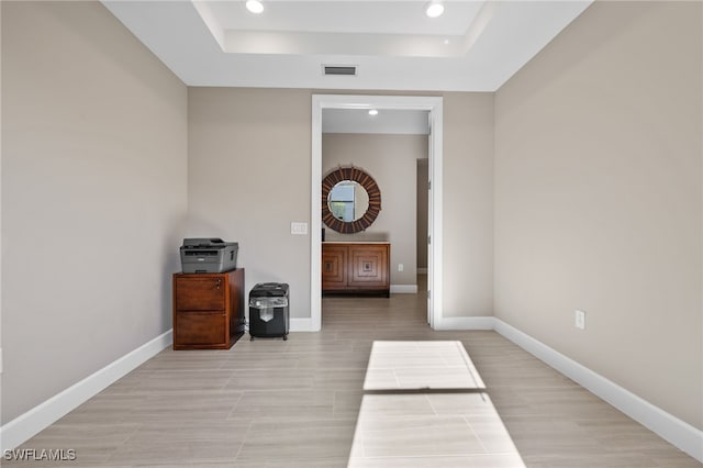 bedroom featuring recessed lighting, a raised ceiling, visible vents, and baseboards