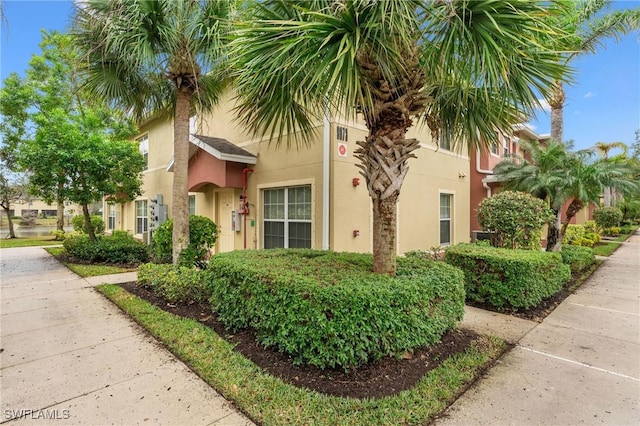 view of property exterior with stucco siding