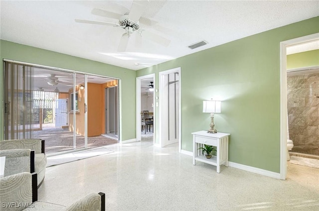 living room featuring a textured ceiling