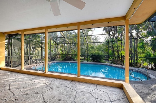 view of pool with a patio area, a lanai, and ceiling fan