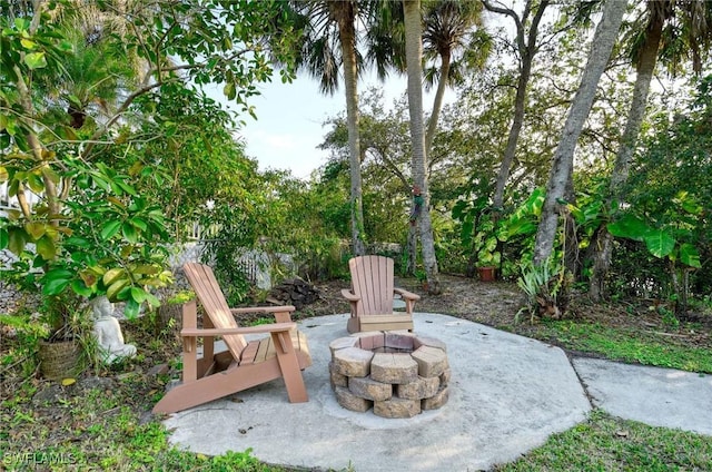 view of patio / terrace with a fire pit