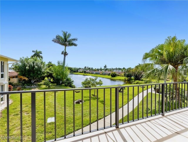 balcony featuring a water view