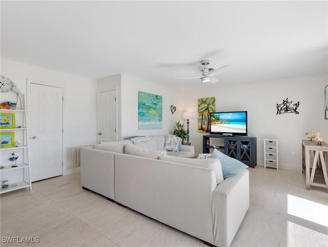 living room with ceiling fan