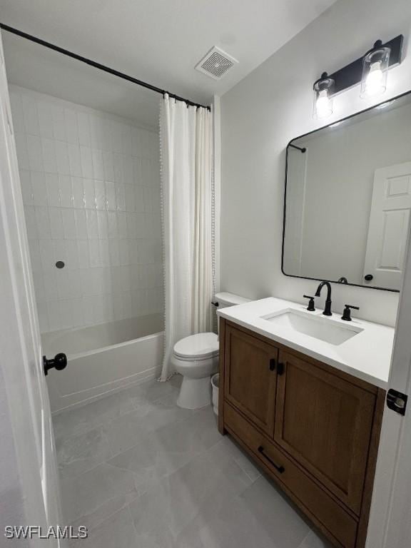 full bathroom featuring vanity, toilet, and shower / bath combo with shower curtain