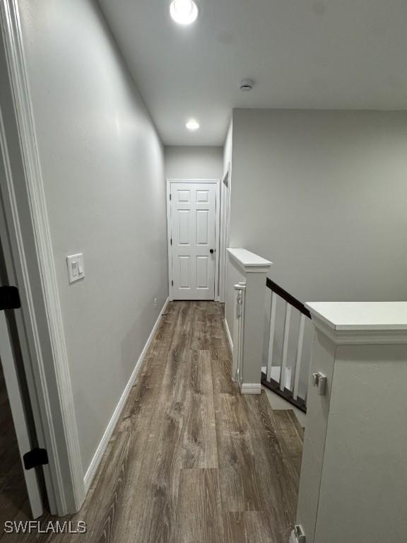 hallway featuring hardwood / wood-style flooring