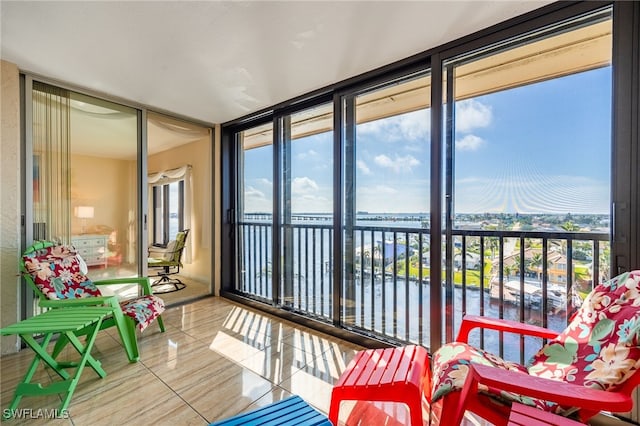 sunroom with a water view