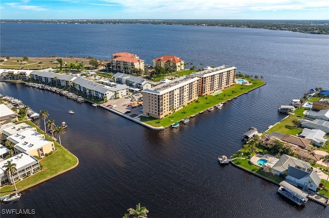 birds eye view of property featuring a water view