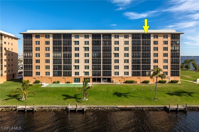 view of property with a water view