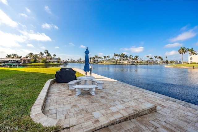 view of patio featuring a water view