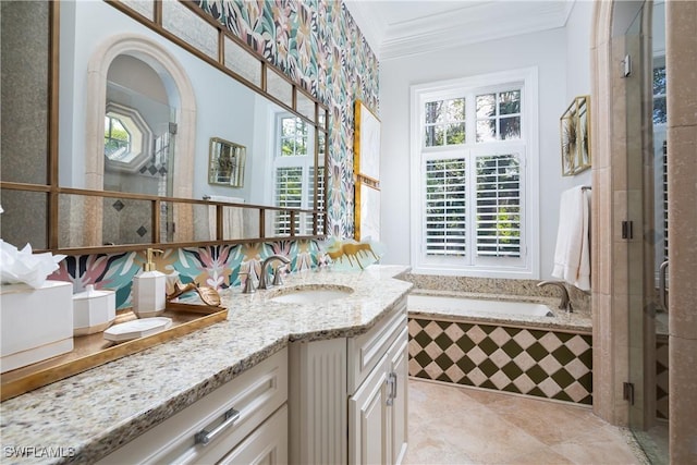 bathroom with crown molding, tile patterned flooring, vanity, and a healthy amount of sunlight