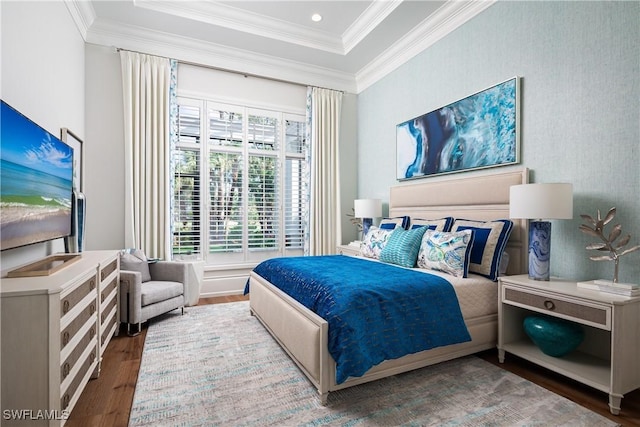 bedroom featuring hardwood / wood-style flooring and ornamental molding