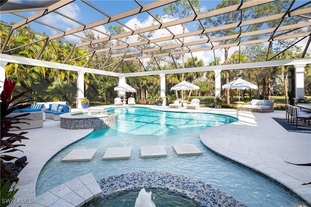 view of swimming pool featuring outdoor lounge area, glass enclosure, a patio area, and an in ground hot tub