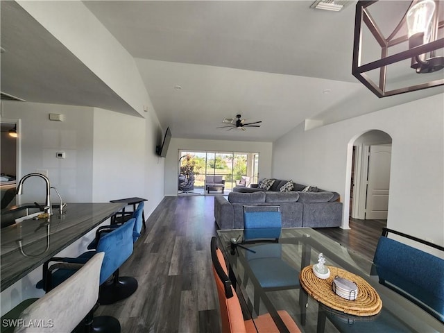 dining room with dark hardwood / wood-style floors and ceiling fan