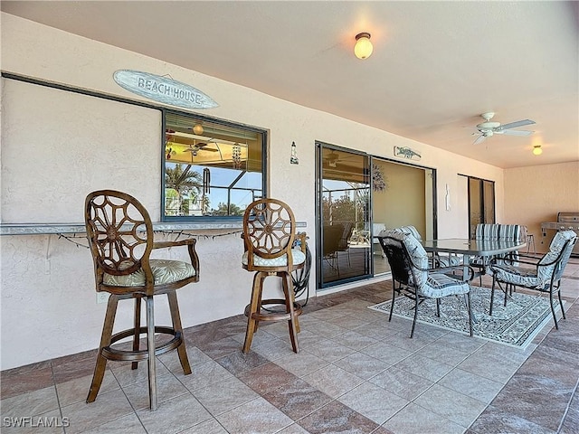 view of patio / terrace with ceiling fan