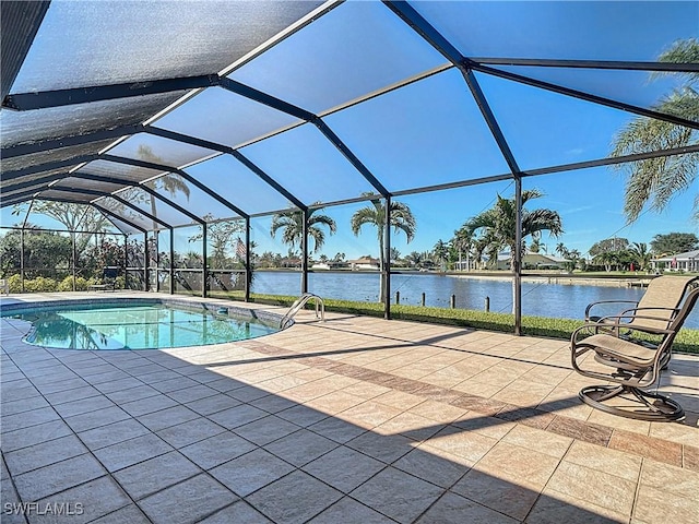 view of pool featuring a lanai, a water view, and a patio