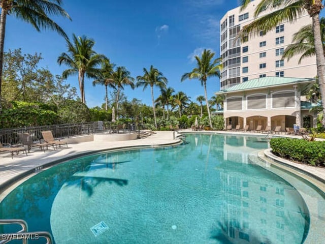 view of swimming pool with a patio area