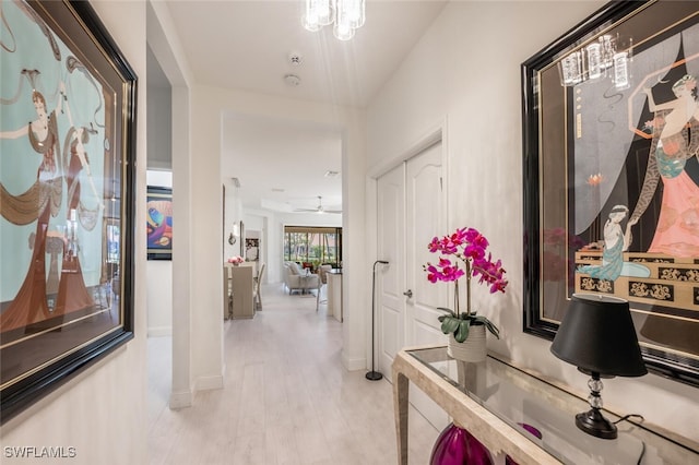 corridor featuring light hardwood / wood-style floors