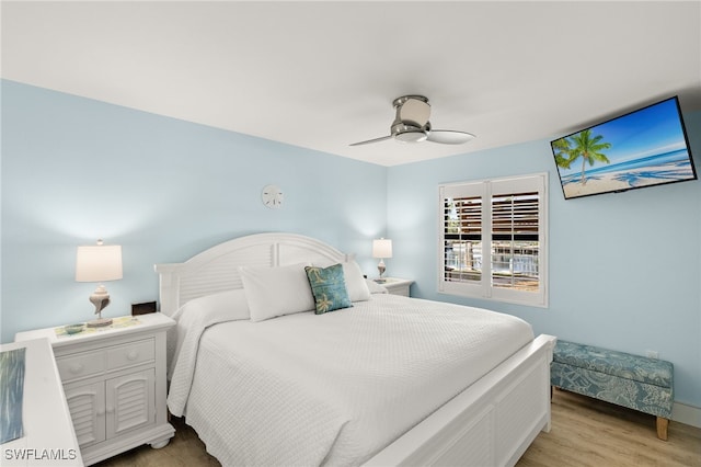 bedroom featuring ceiling fan and light wood-type flooring