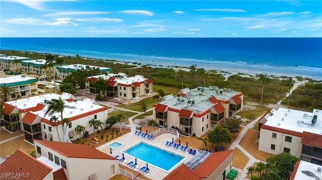 aerial view with a view of the beach and a water view