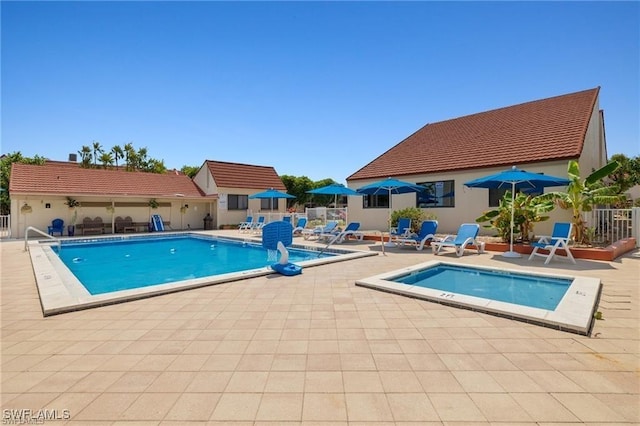 view of pool featuring a patio area