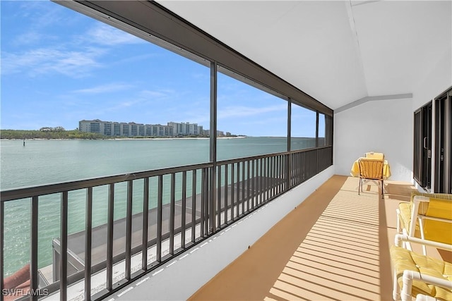 balcony featuring a water view