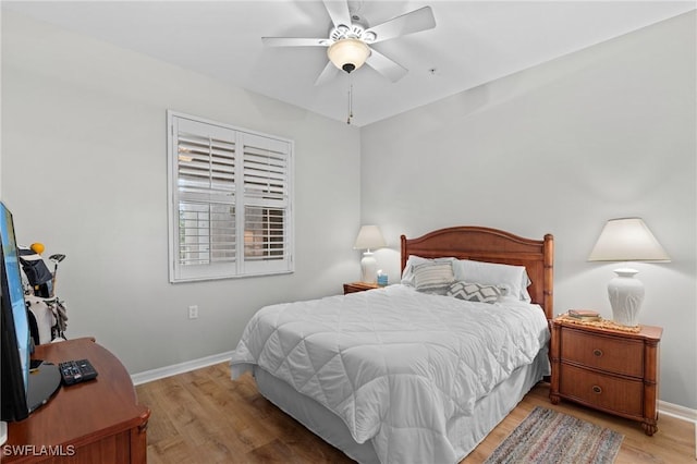 bedroom featuring ceiling fan and light hardwood / wood-style floors