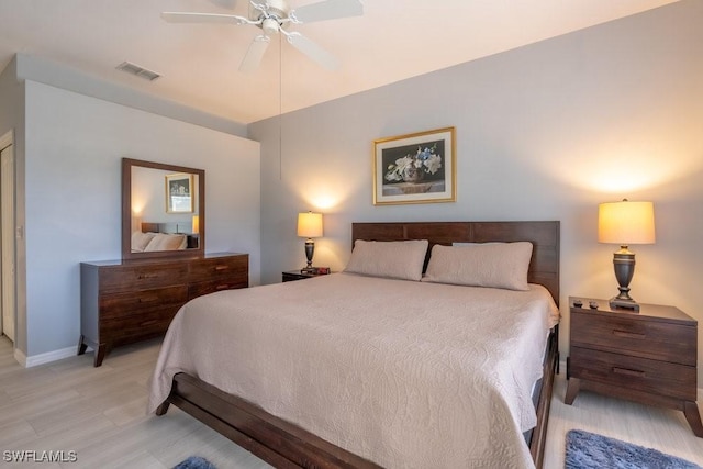 bedroom featuring ceiling fan and light hardwood / wood-style floors