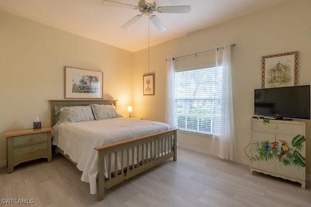 bedroom featuring ceiling fan